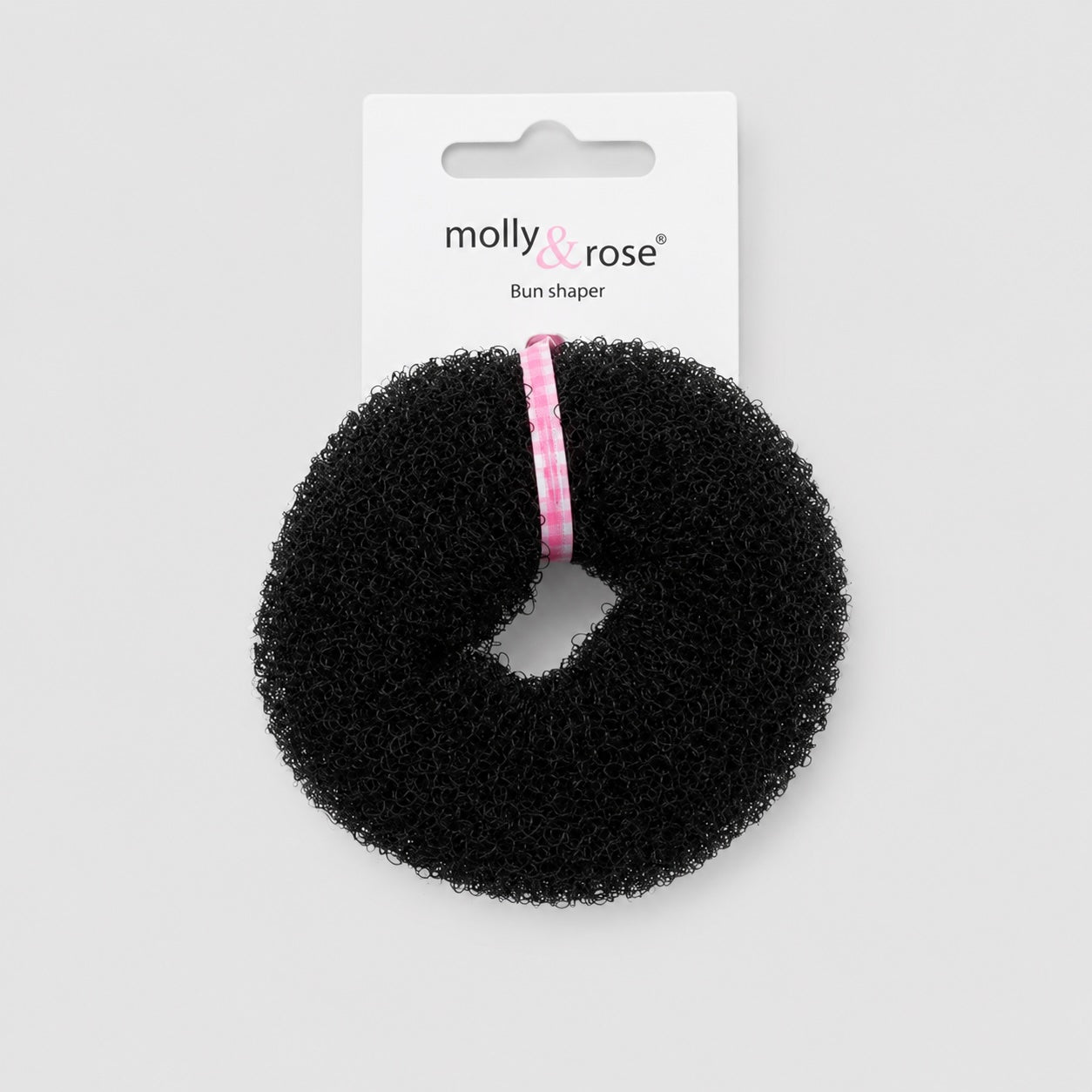 Black Molly Rose ballet bun doughnut hair accessory with packaging on light grey background