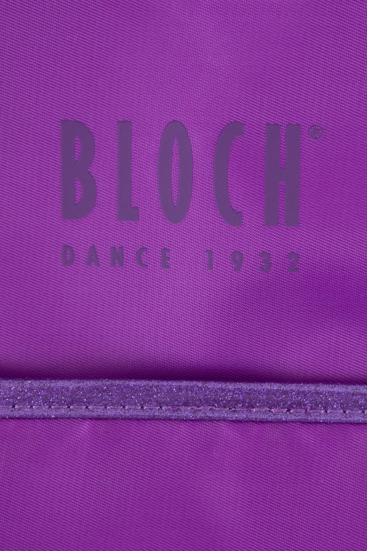 Close-up of glitter trim on Bloch A6350 purple dance bag