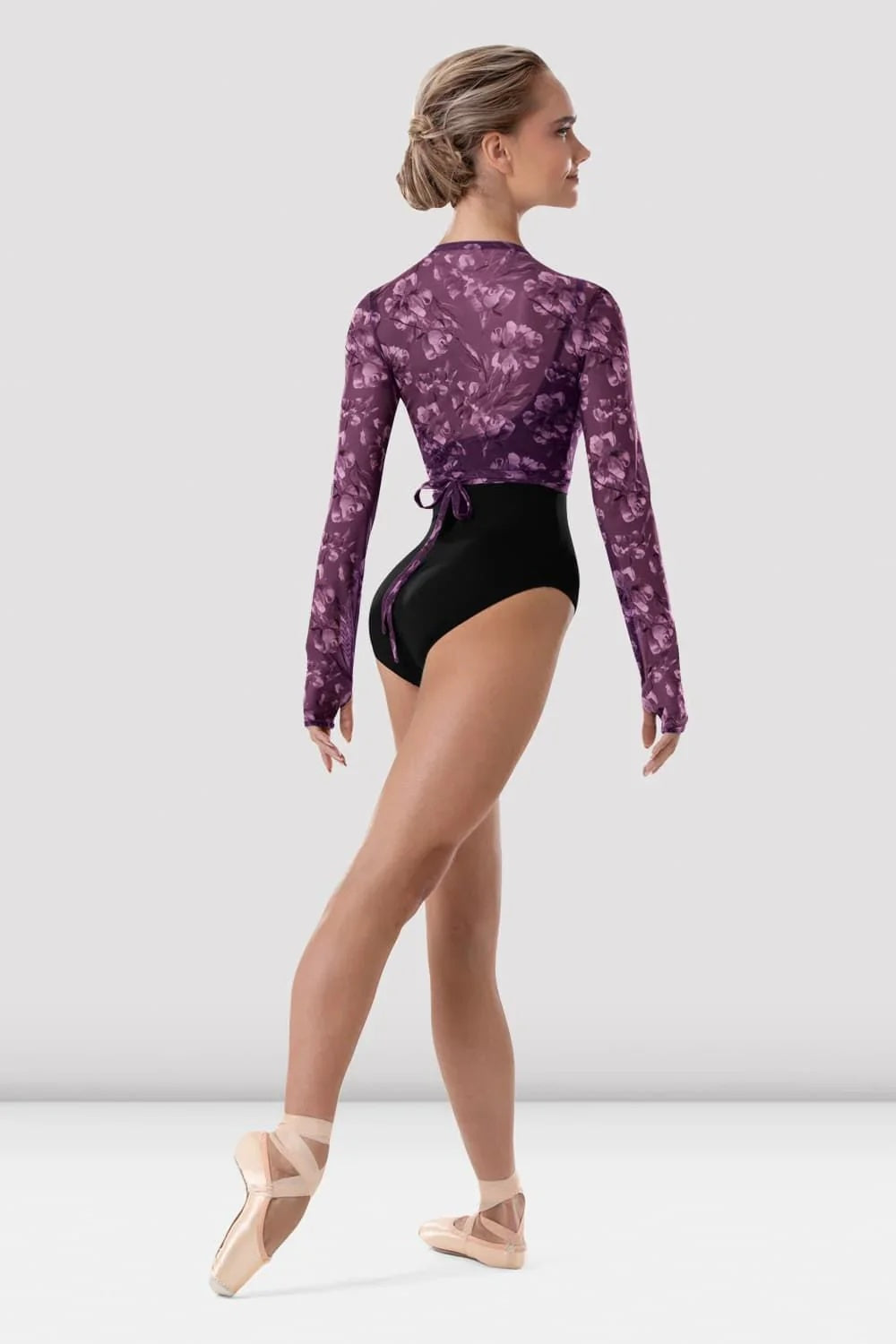 Dancer wearing Bloch Arden floral ballet wrap top Z4146 in Elegance back view