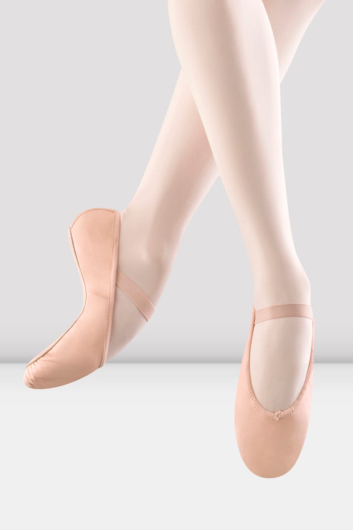 Adult ballet shoes worn with tights