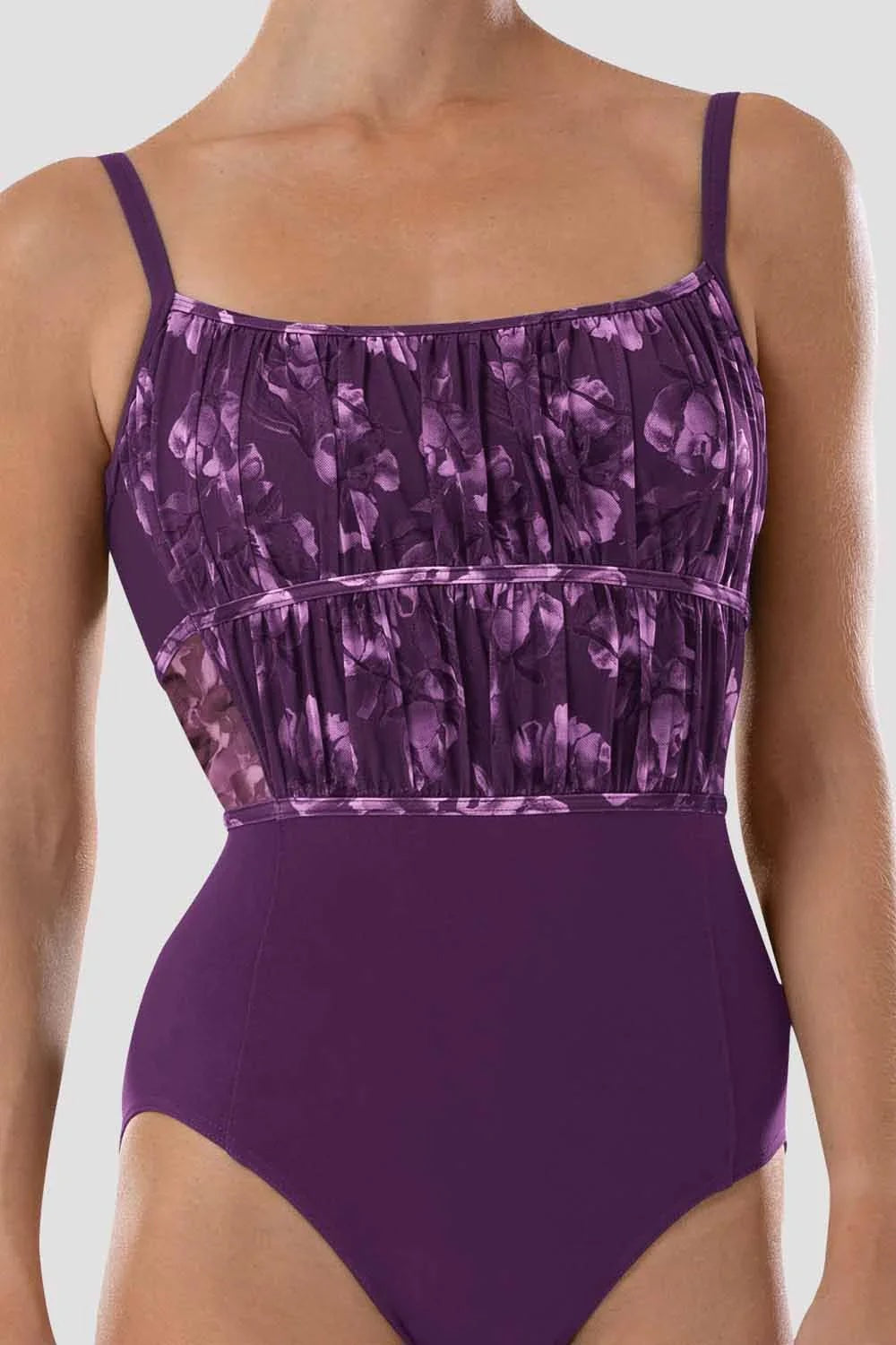 Close up of Bloch Ayla floral ballet leotard in purple showing mesh and ruched detail