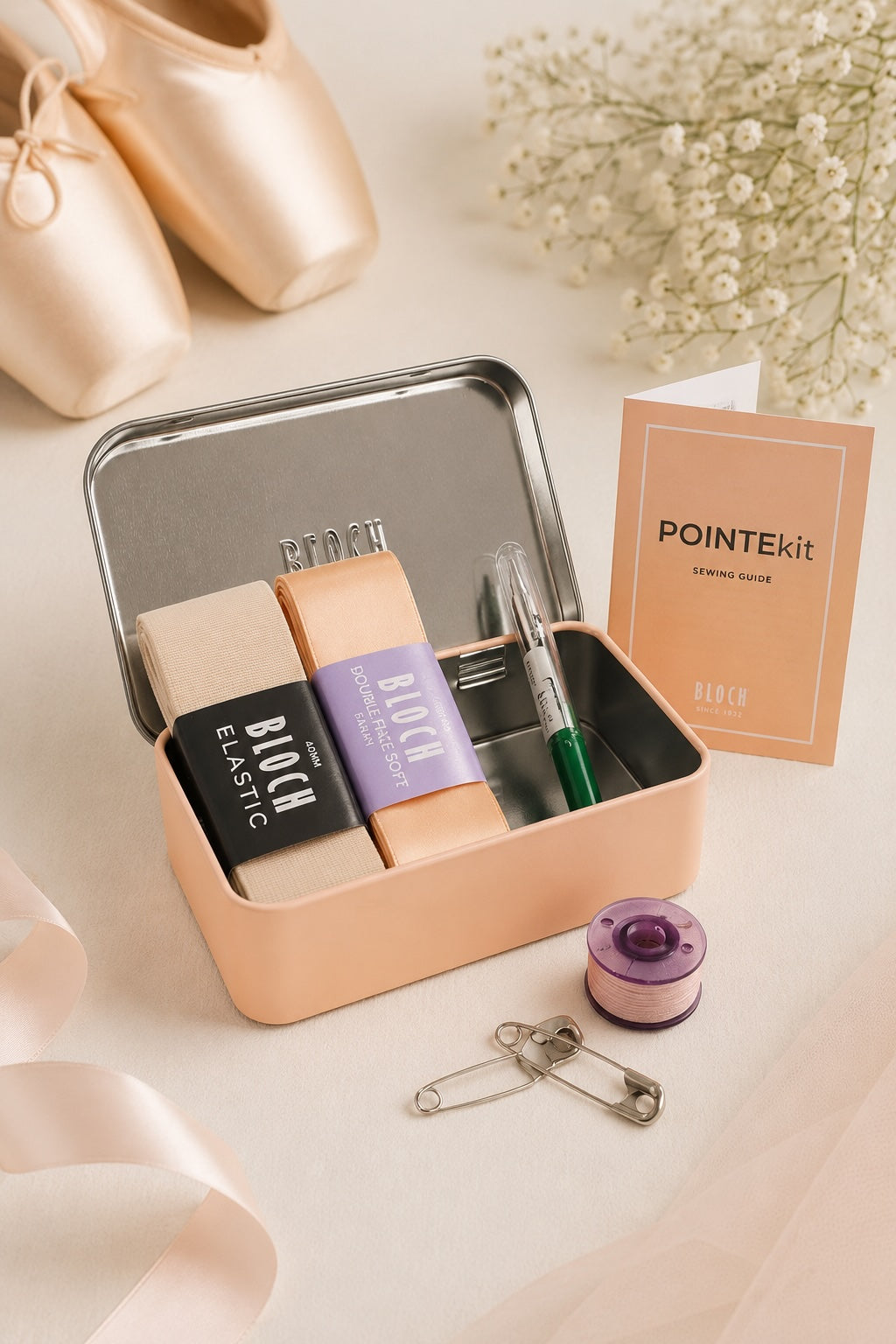 Bloch Classic Pointe Shoe Ribbon Kit A0524 styled with pointe shoes, satin ribbons and sewing accessories in an elegant ballet-inspired flat lay.