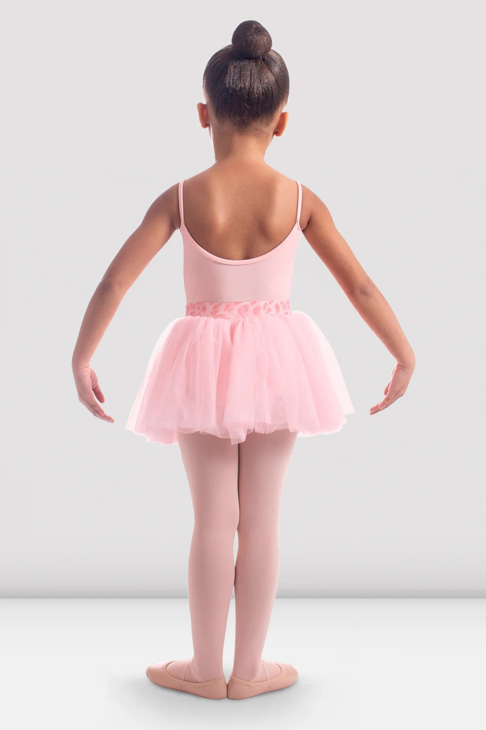 Back view of girl wearing Bloch CR6521 Candy Pink tutu skirt with animal print waistband