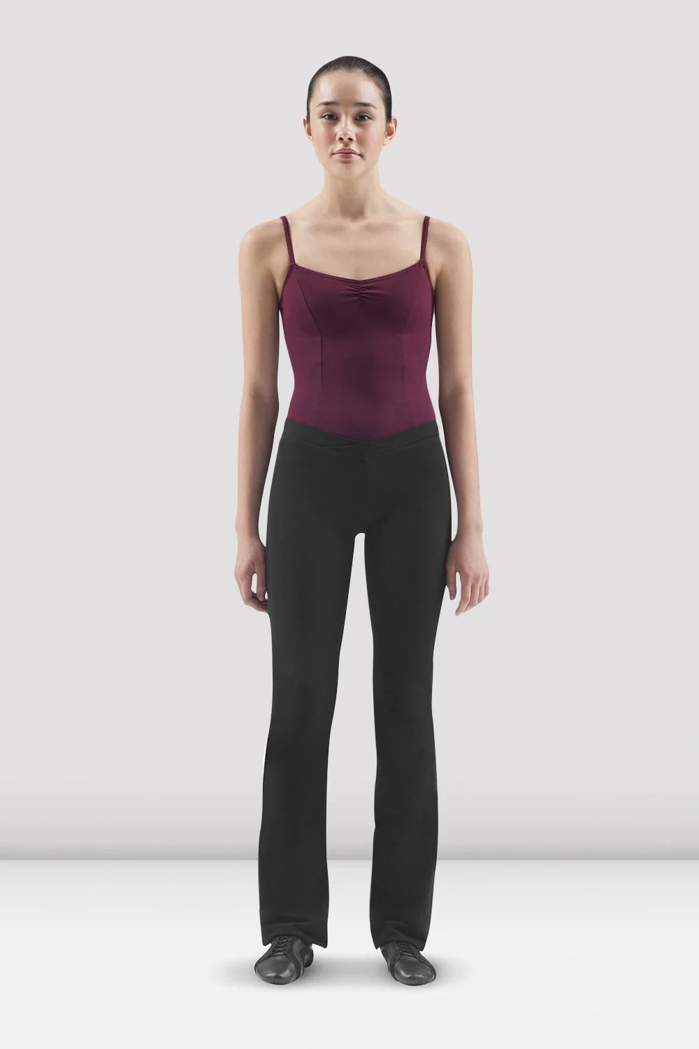 Front view of Bloch Ecarte P3618R ladies black jazz pants showing the V-front waistband and gently flared legs.
