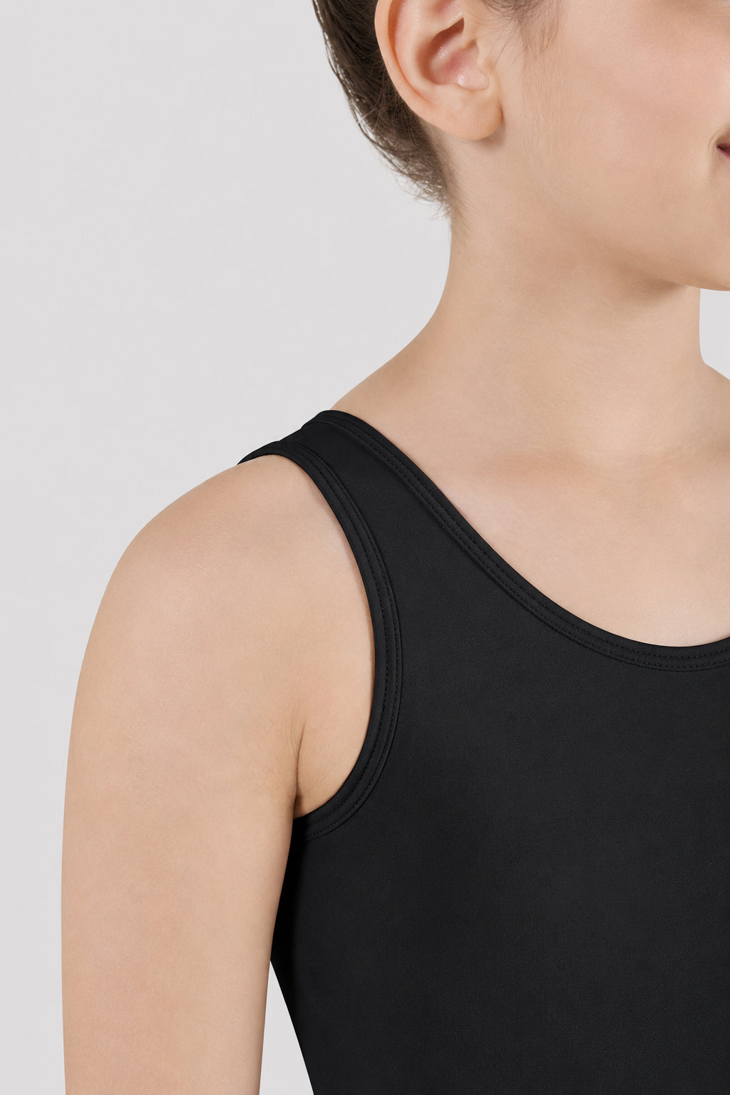 Close-up of Bloch Dynamic black tank leotard CL5605 shoulder strap and neckline