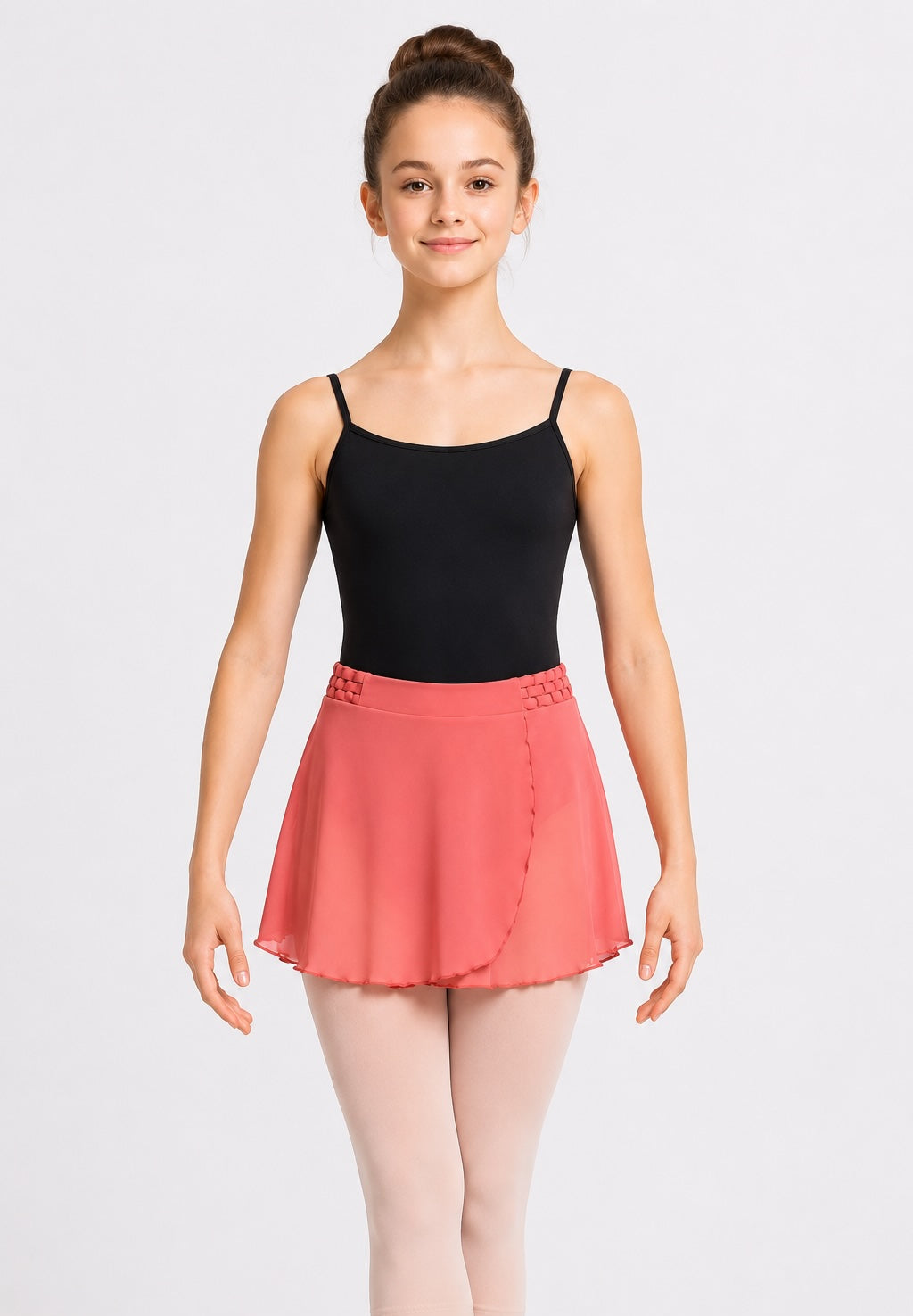Bloch Maeve fixed wrap ballet skirt in Sunset worn with black leotard, showing front view and interwoven waist detail
