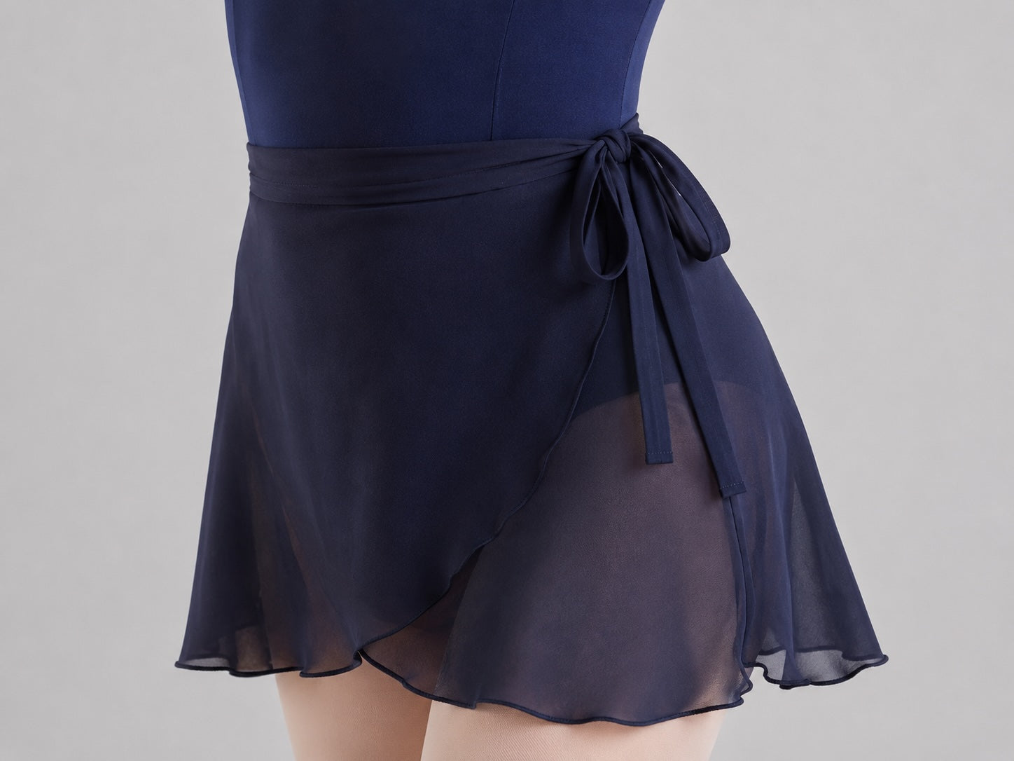 Close up of adjustable tie waist on Bloch R5130 navy georgette ballet wrap skirt
