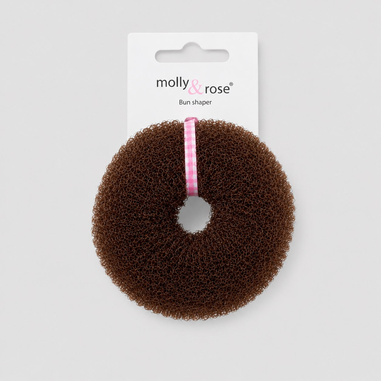 Brown Molly Rose ballet bun doughnut hair accessory with packaging on light grey background