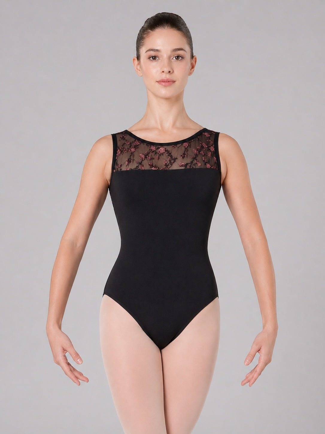 Capezio Allure black ballet leotard with floral mesh back detail, front view on dancer
