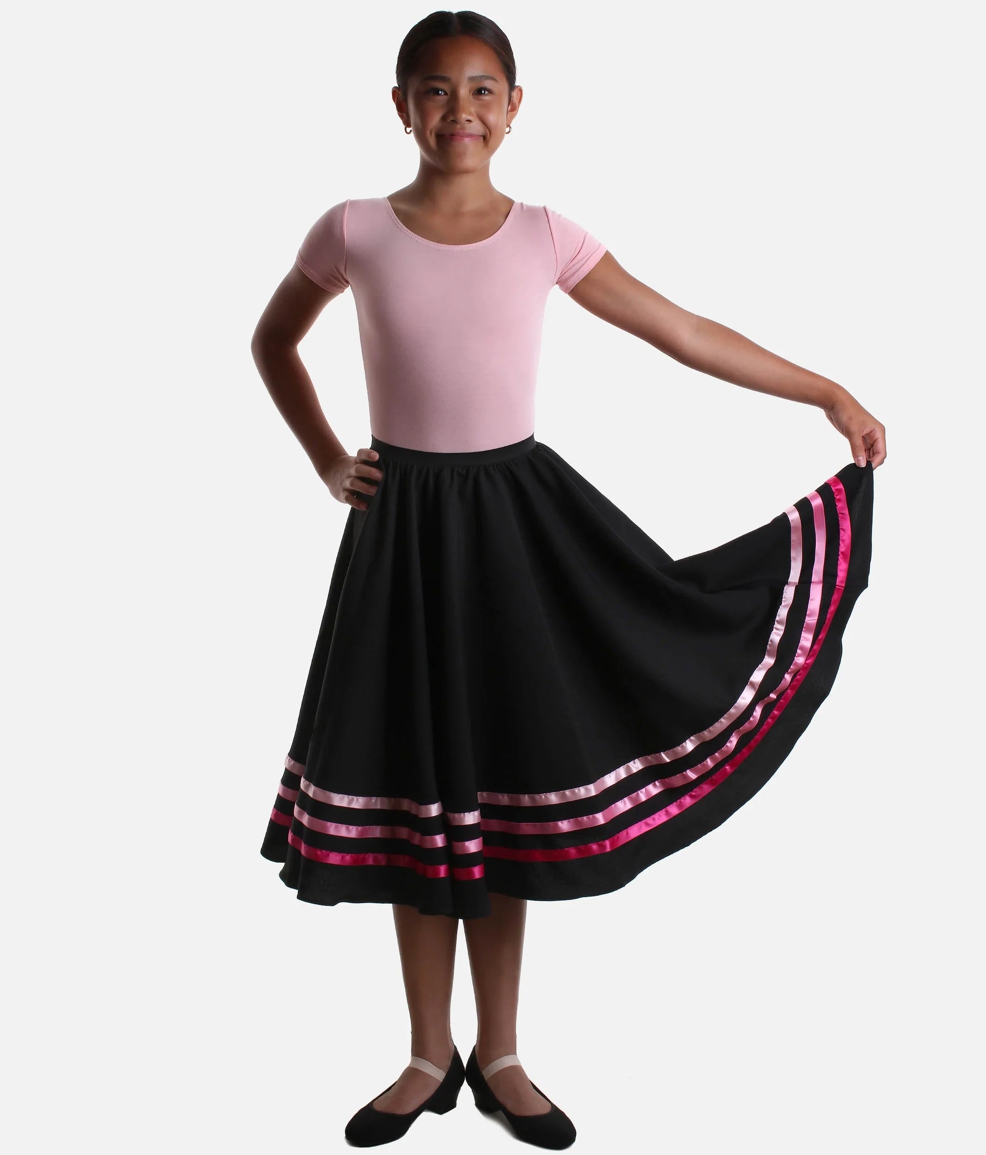 Pink RAD & ISTD approved character dance skirt front view as worn by dancer