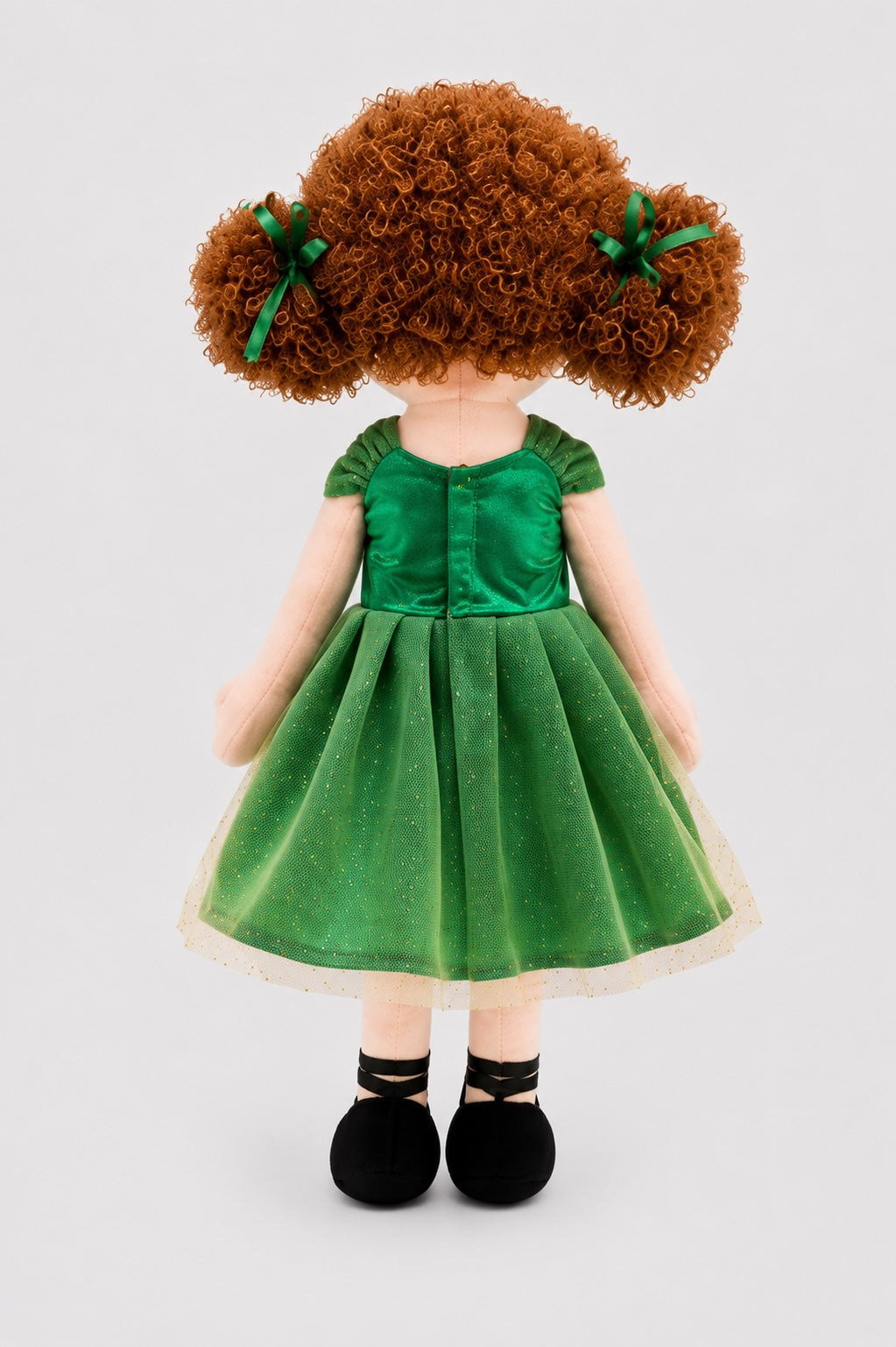 Back view of Daydream 35cm Irish dancing doll showing curly hair, green ribbons and glitter dress
