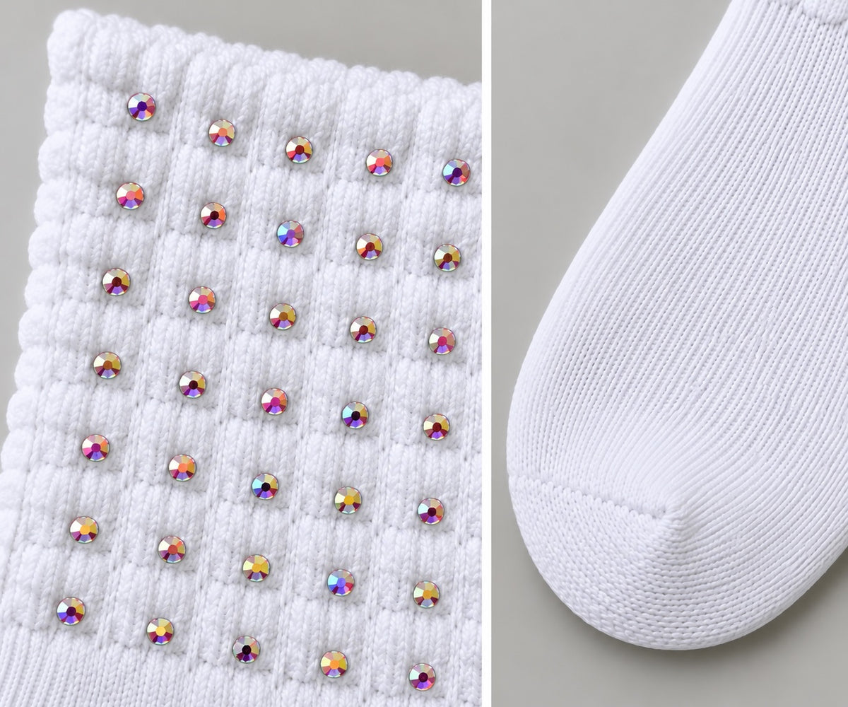 Close-up of white Feis Sock Irish dancing poodle socks featuring sparkling AB diamanté crystals on the textured cuff and a smooth knitted toe.