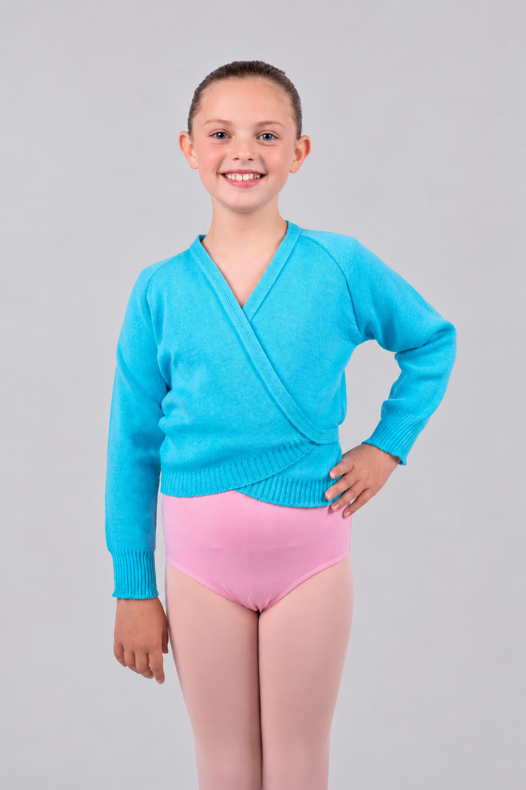 Girls' regulation ballet wrap cardigan in marine blue/teal, front view showing crossover design and long sleeves