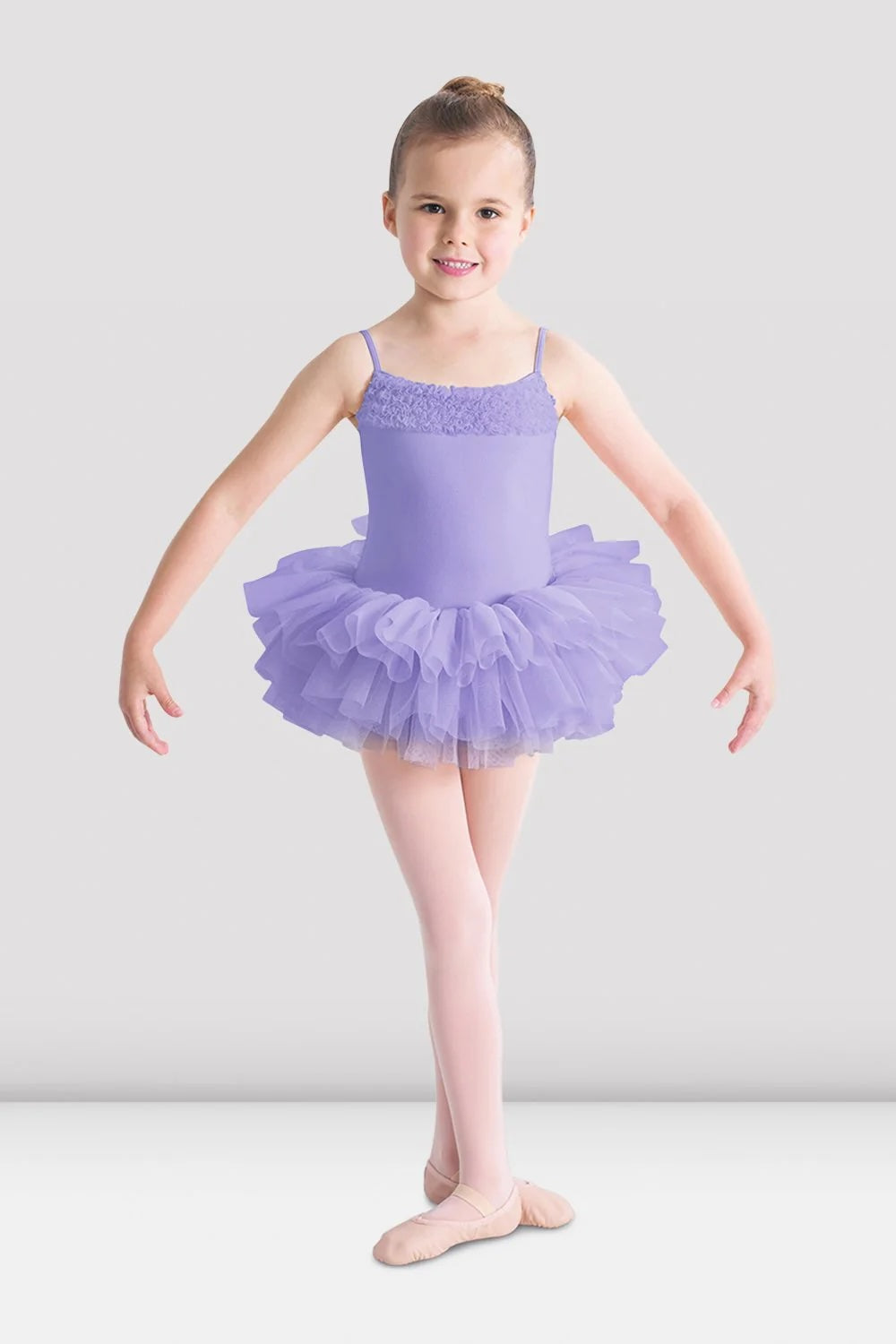 Girl wearing Bloch Desdemona lilac tutu leotard with lace bodice and layered tutu skirt