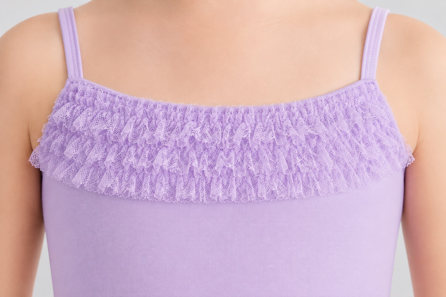 Close-up of the lace bodice detail on the Bloch Desdemona lilac tutu leotard
