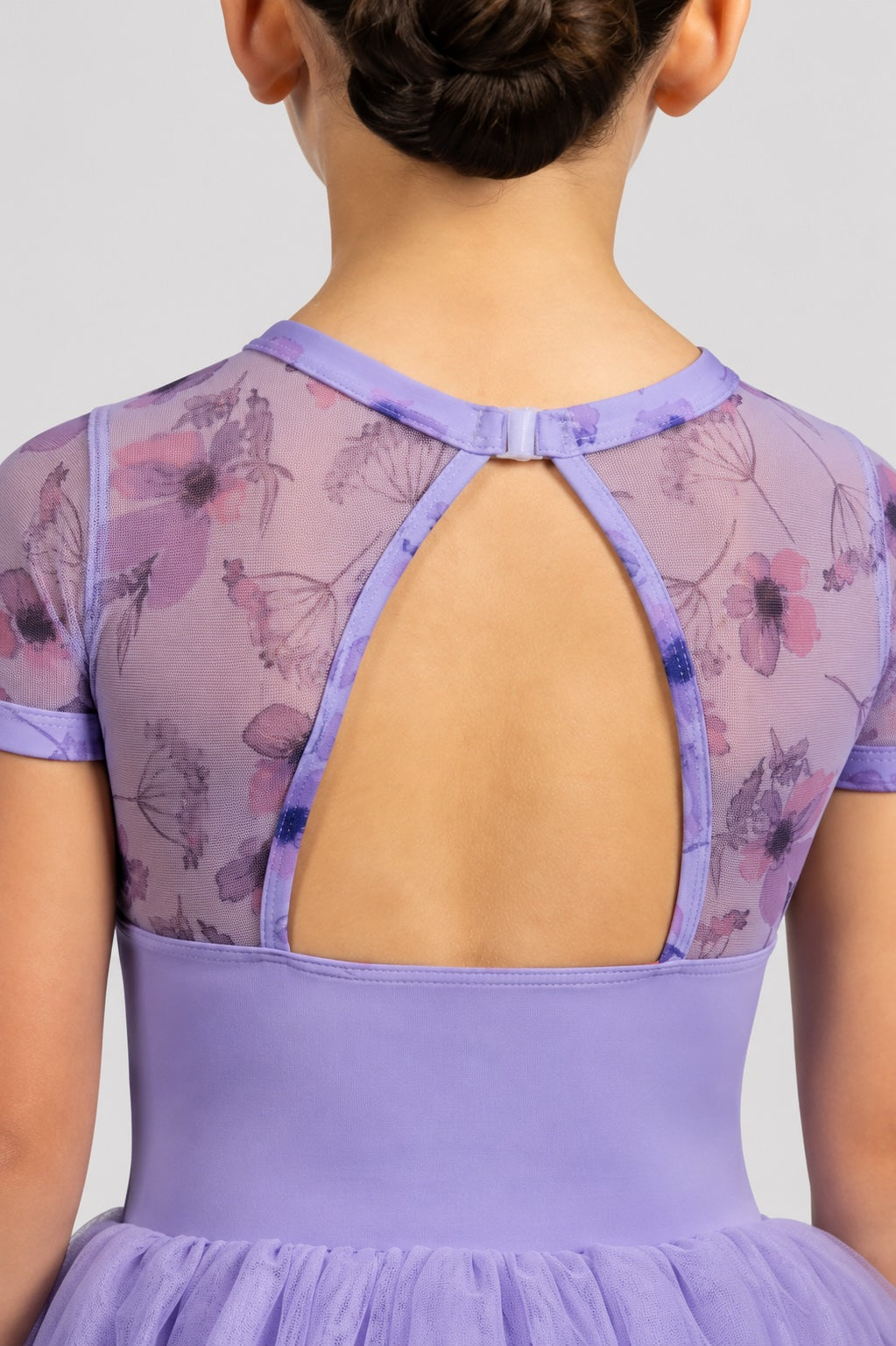 Close-up of the floral mesh open back detail on the Bloch CL4282 lilac ballet tutu dress