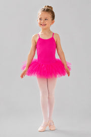 Girls pink 5 layer ballet tutu dress by 1st Position shown on a young ballerina against a light grey background