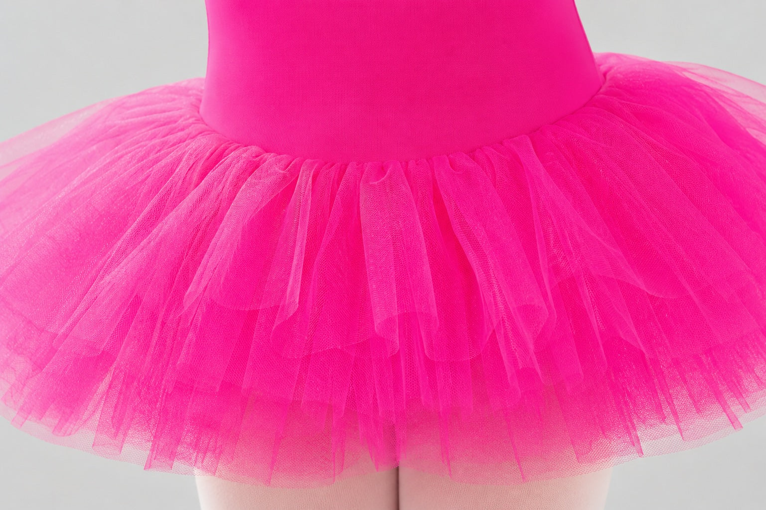 Close-up of the five layered tutu skirt on the girls pink ballet tutu dress by 1st Position