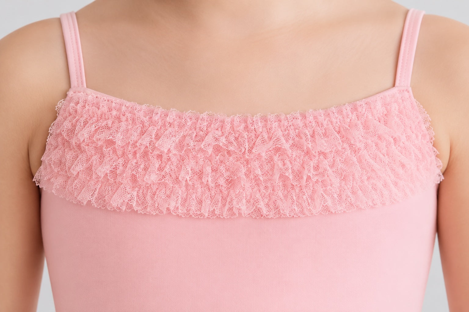 Close-up of the floral lace bodice detail on the Bloch Desdemona pink tutu leotard