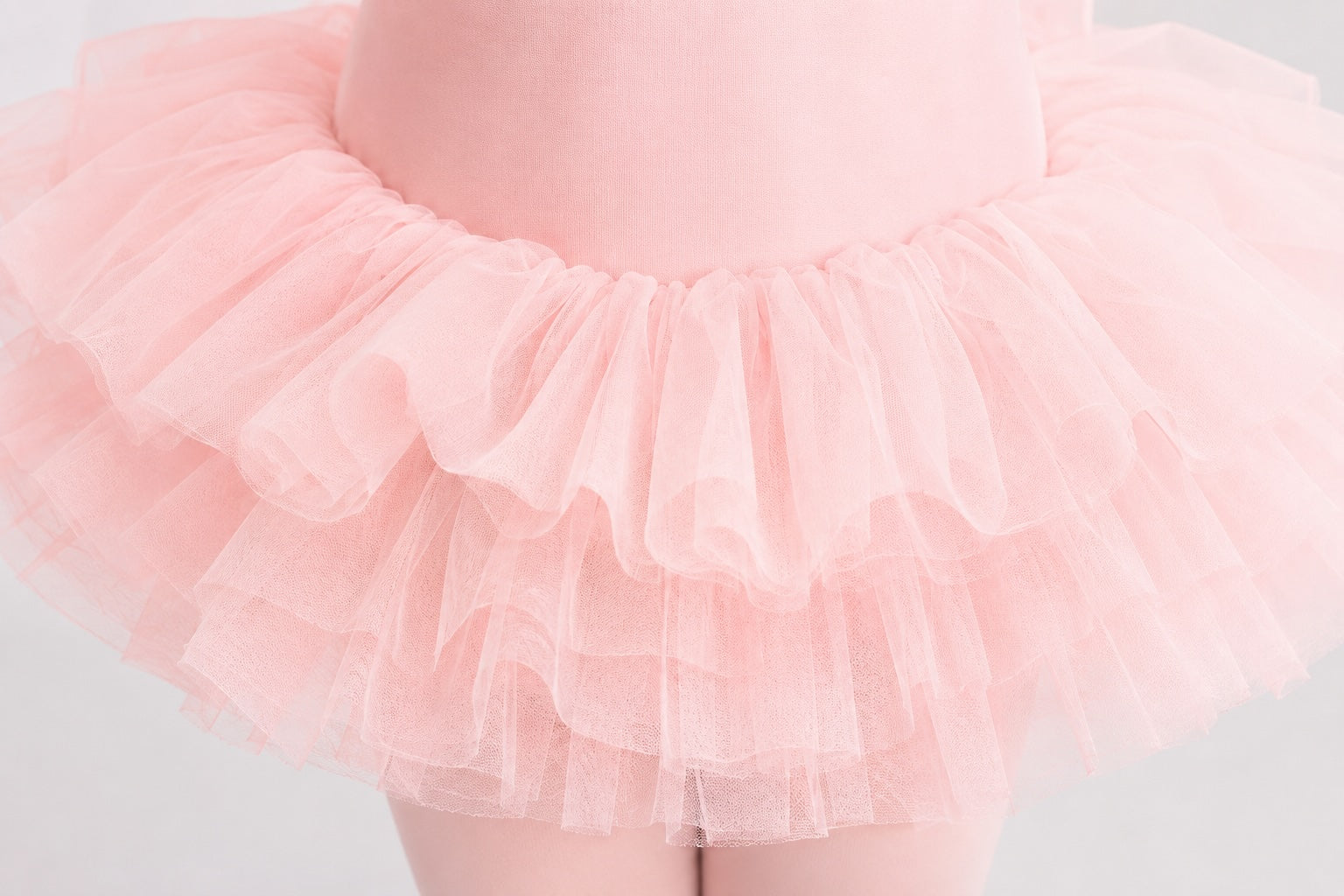 Close-up of the layered pink tulle tutu skirt on the Bloch Desdemona tutu leotard