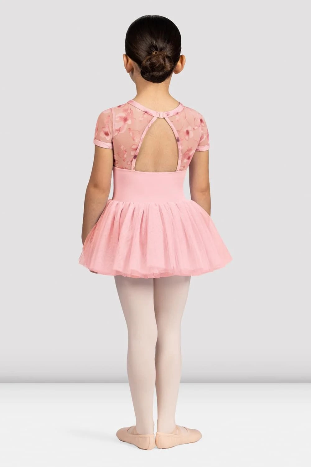 Back view of Bloch CL4282 pink floral ballet tutu dress showing floral mesh open back detail

