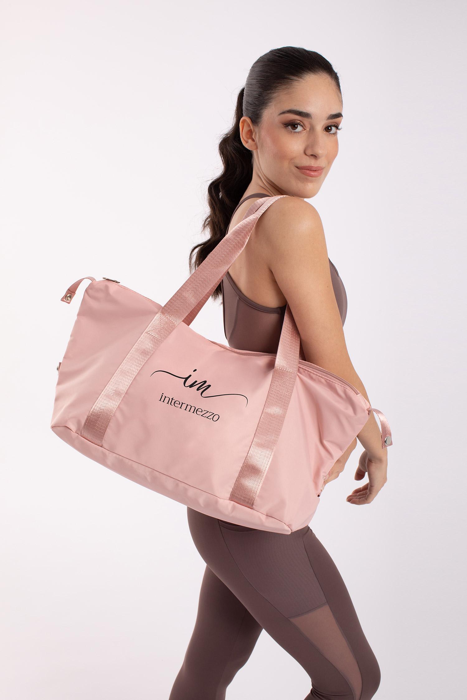Dancer carrying Intermezzo Delani pink dance bag