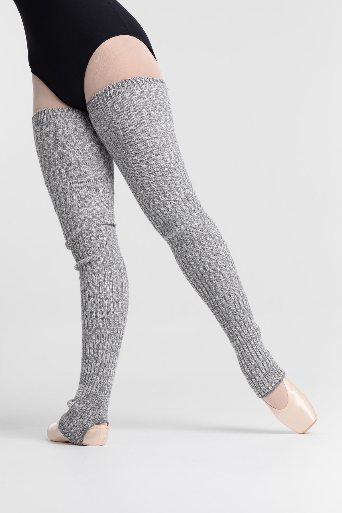 Dancer wearing Intermezzo Extra Long Stirrup Dance Legwarmers 2025 in Grey