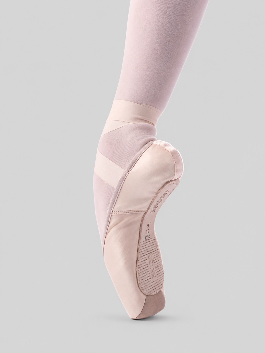 Merlet Belle pointe shoes side sole view showing shank and outsole on light grey background