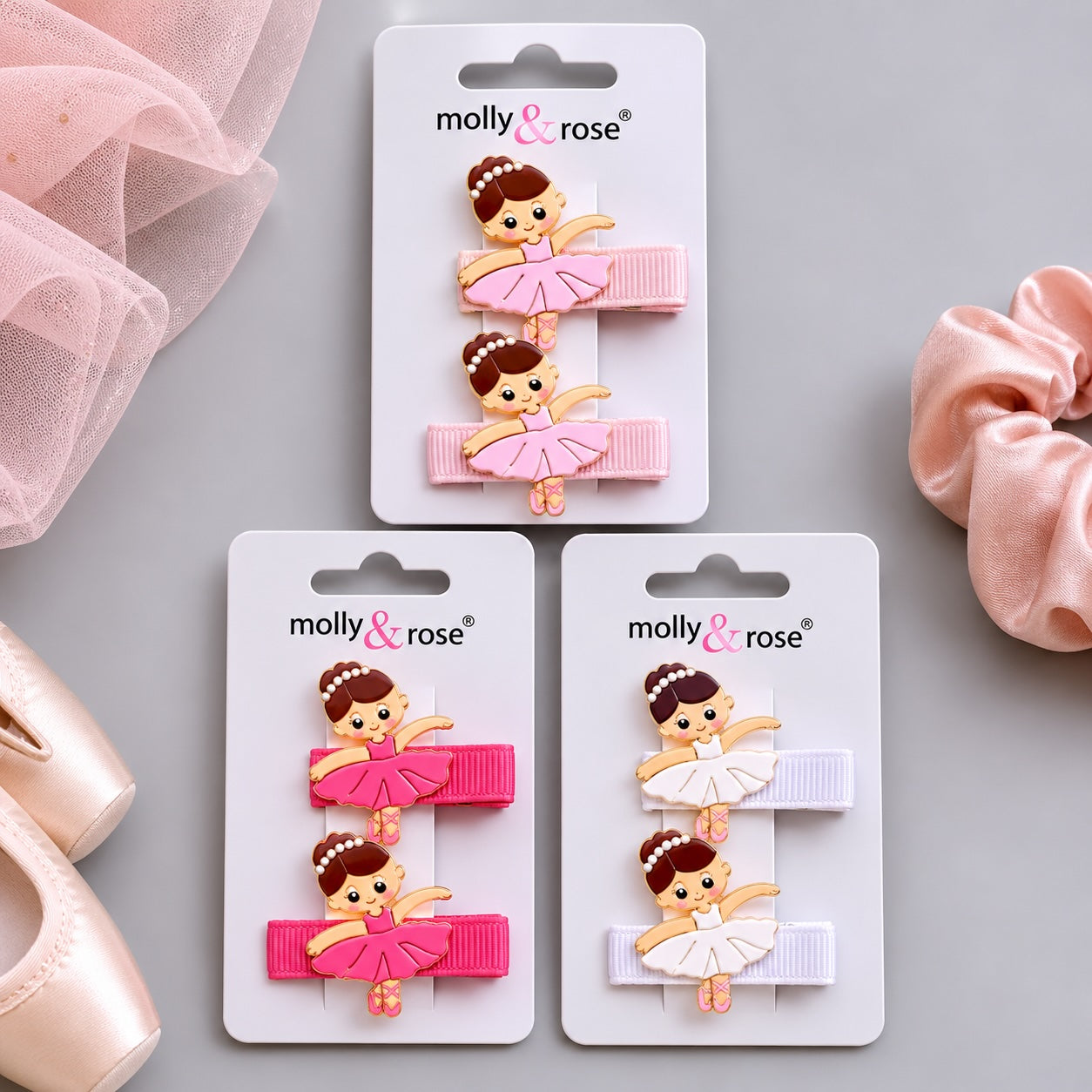 “Set of two Molly & Rose ballerina beak hair clips in pink, light pink and white colour options”