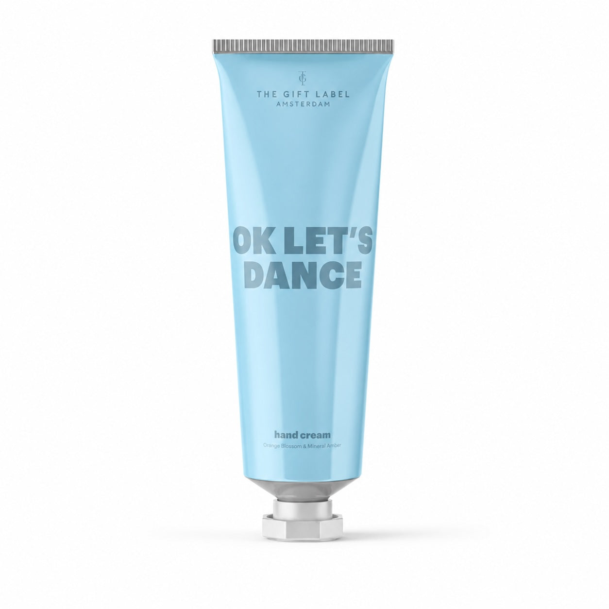 OK Let’s Dance hand and body cream on a soft light grey background with clean boutique styling.