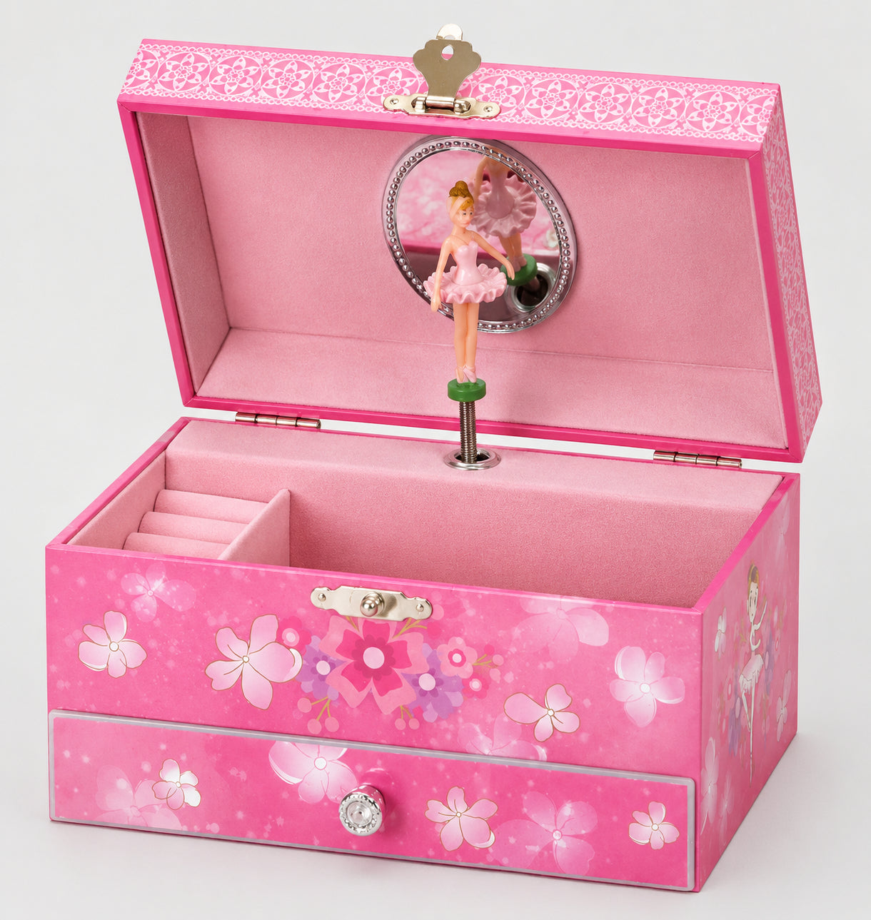 Open pink ballerina musical jewellery box with spinning ballerina figure, mirror and drawer on light grey background