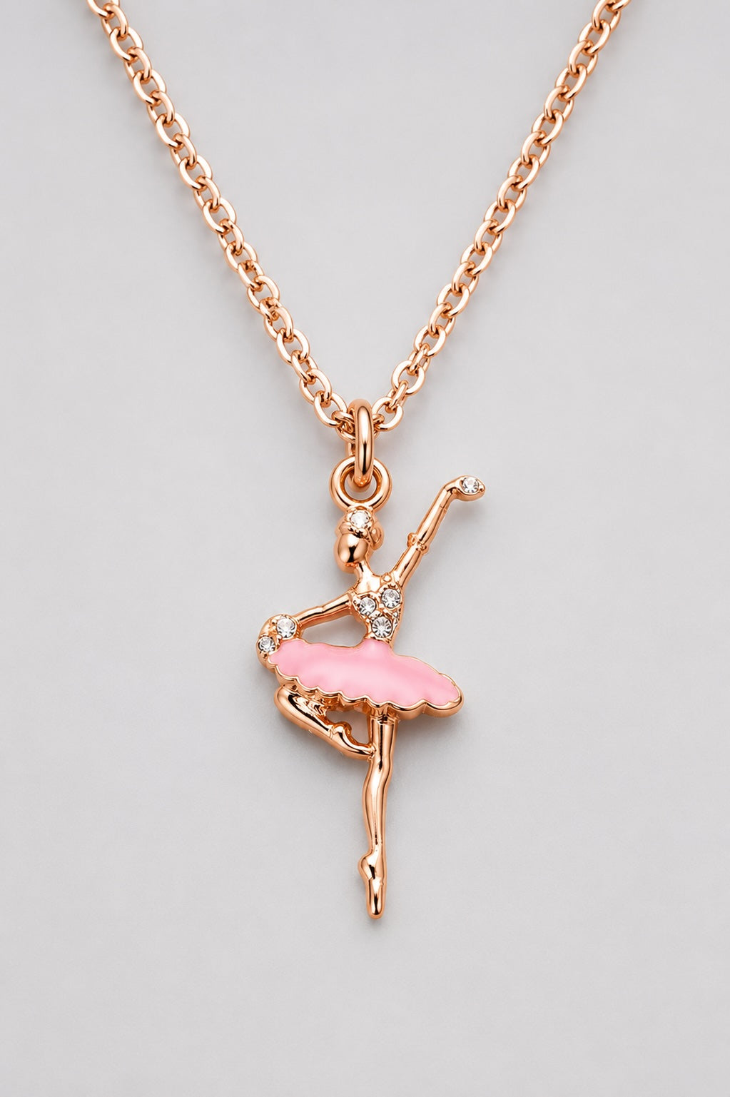 Rose gold ballet dancer pendant necklace for girls with pink tutu detail and crystal accents