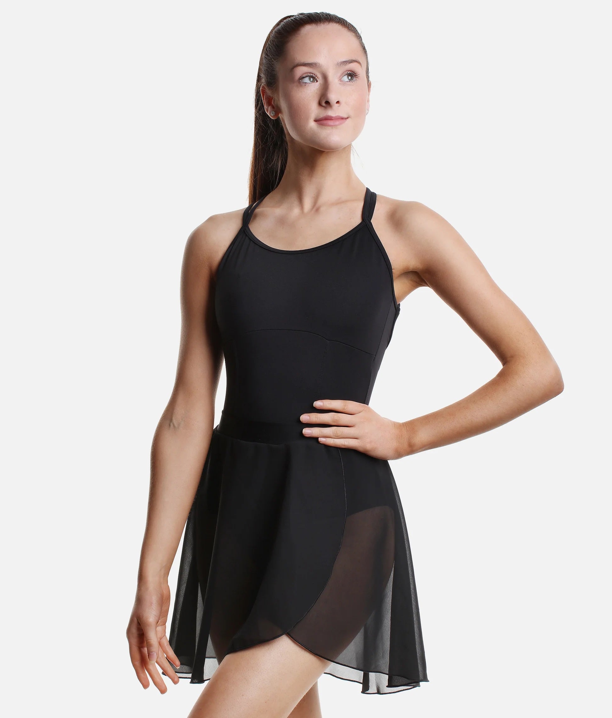 Dancer wearing black So Danca SL93 pull-on faux wrap ballet skirt front pose