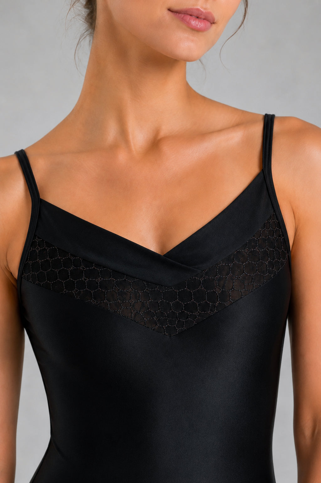 Alt Text: Close-up front detail of the So Danca Ravena BY64 black ballet leotard showing mesh neckline