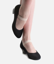 Dancer wearing So Danca RO14 black canvas Cuban heel character shoes