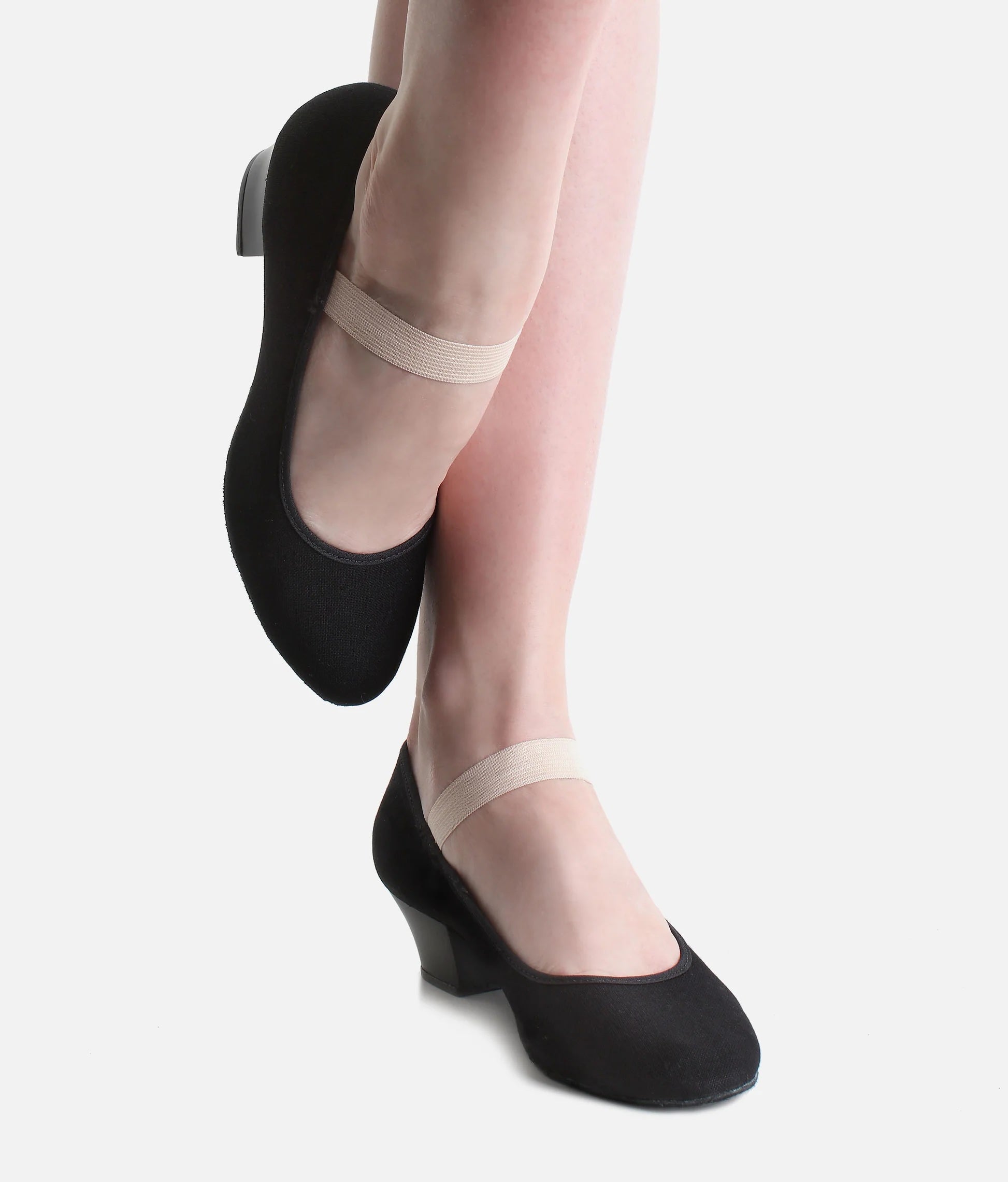 Dancer wearing So Danca RO14 black canvas Cuban heel character shoes