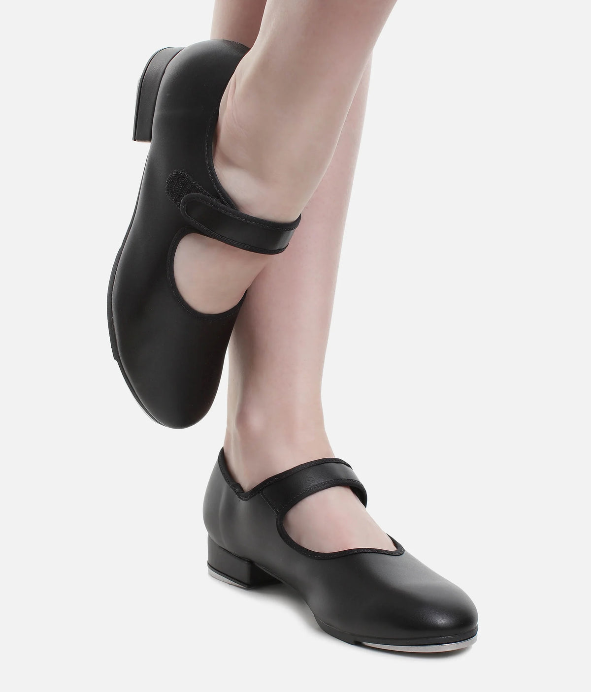 So Danca TA38 adult black Velcro tap shoes worn with feet crossed