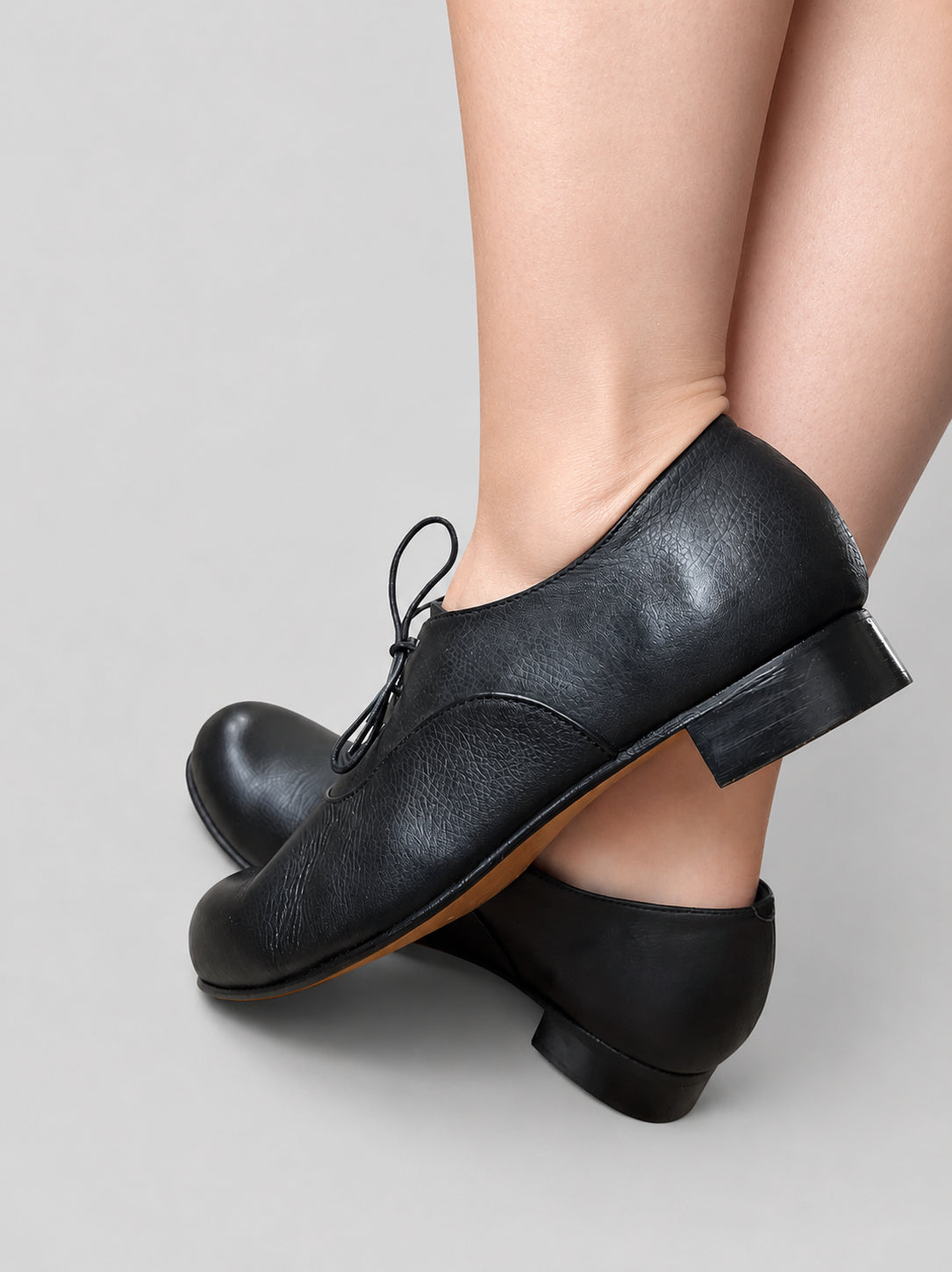 Sona Dance Erin black set dancing shoes worn on foot showing side profile, heel and fit