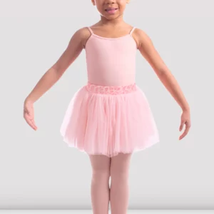 a young girl in a pink tutu ballet ballerina bloch skirt