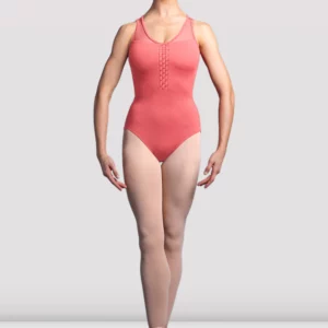 a woman in a leotard and ballet shoes, ballerina wearing a bloch leotard in coral colour