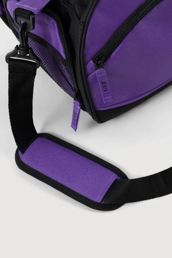 Hand-held straps make for an easy-to-carry bag with the option of an adjustable long strap for cross-body wear. Two separate internal shoe catchments are what make this bag ideal for the dancer who does it all, keeping your shoes separate and easily accessible. Detailed with an exterior drink bottle compartment, mobile phone attachment, and interior and exterior zipper sections with pockets. Fuschia Pink colour