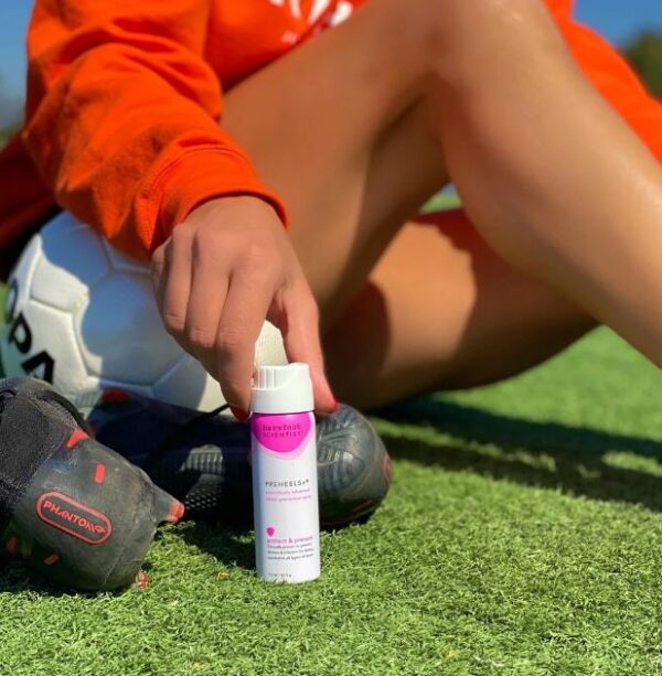 "Woman applying PreHeels+ before wearing sandals" "Runner using PreHeels+ spray for anti-chafing protection" "Dancer spraying PreHeels+ on feet before performance" "Blister prevention for travel, dance, and sports activities"